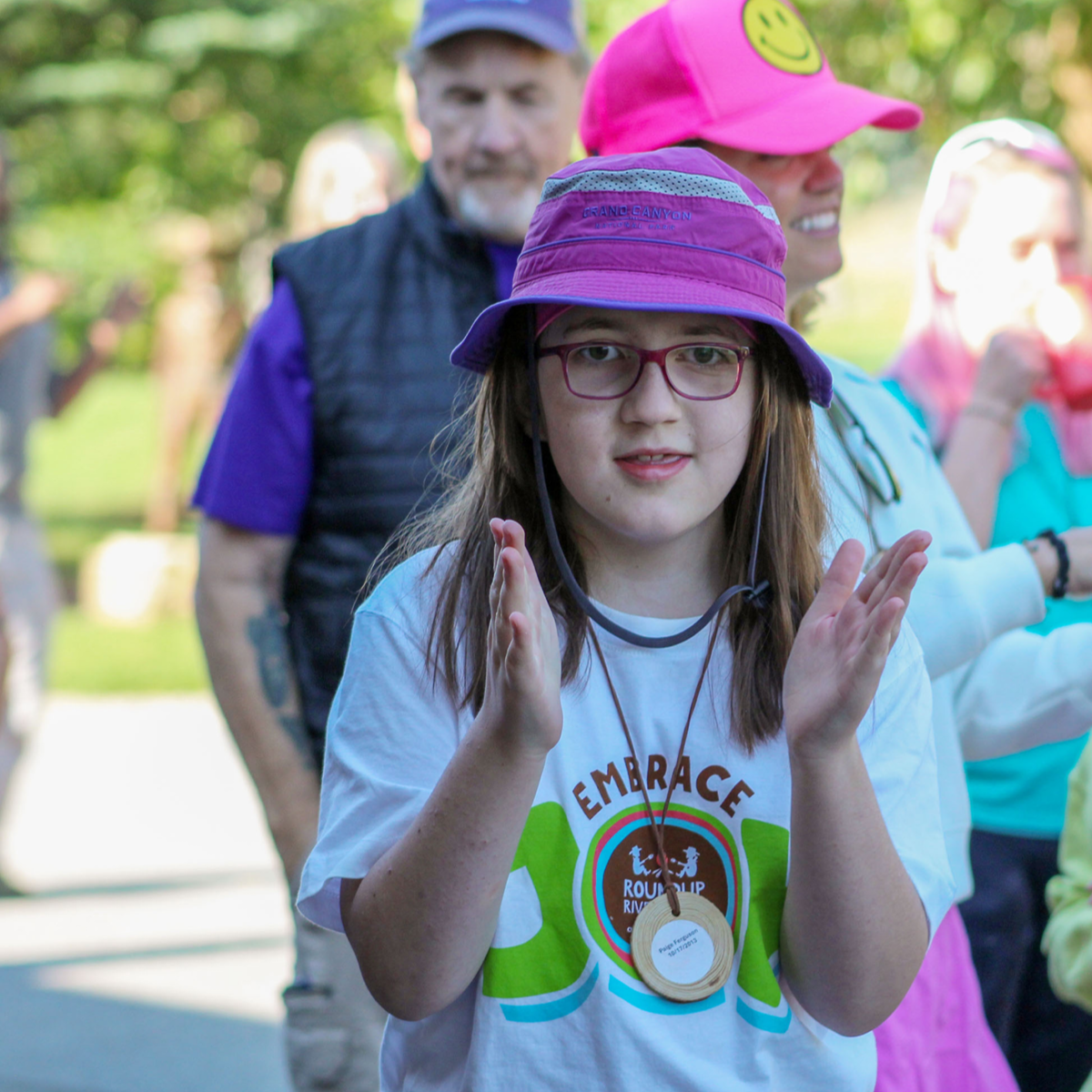 Camper Paige clapping her hands.