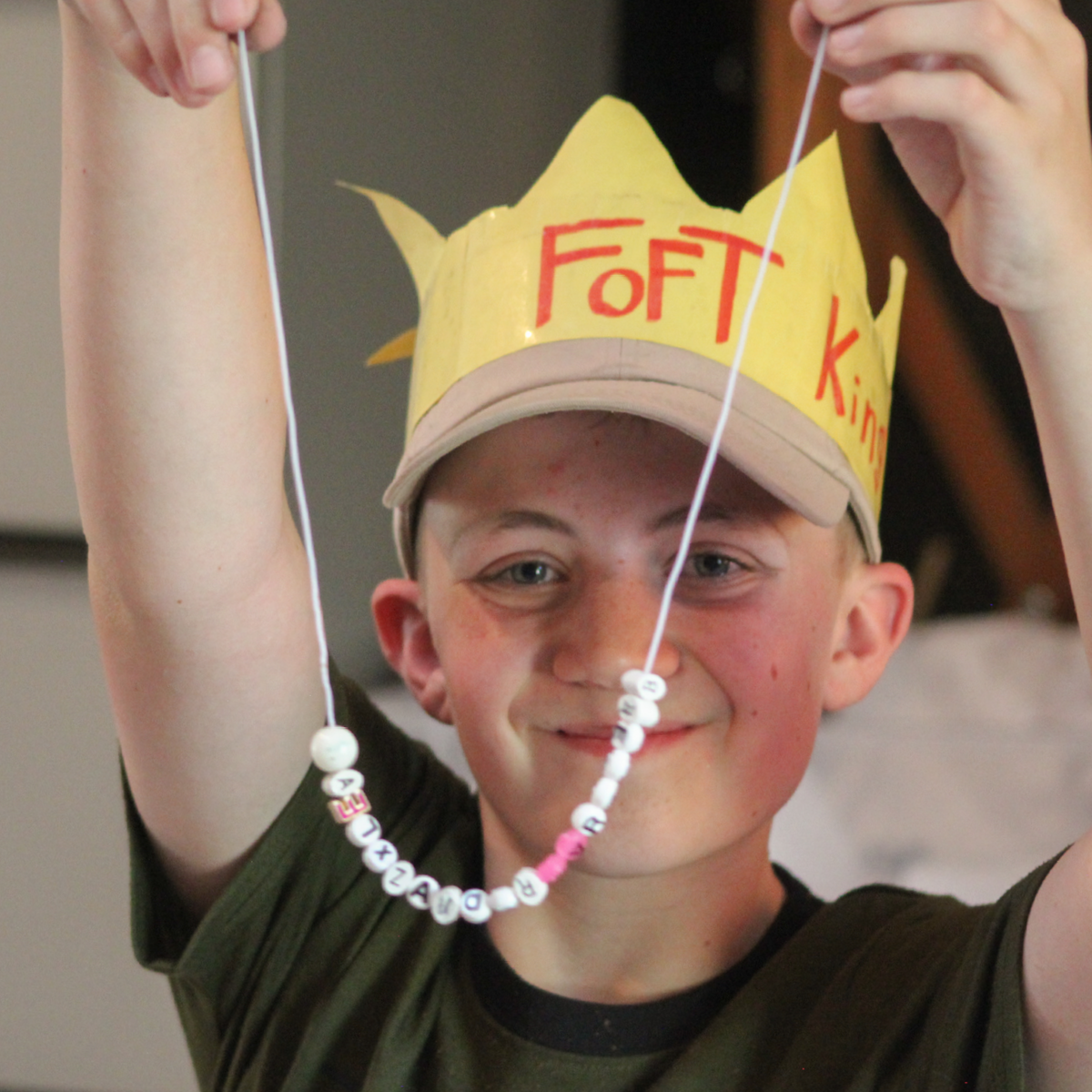 Camper with the beaded necklace he made