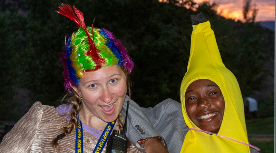 Two camp staff in costumes